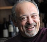 Image of Mischa Weisz. He is an older man with grey hair and a go-tee, smiling and laughing, looks happy.